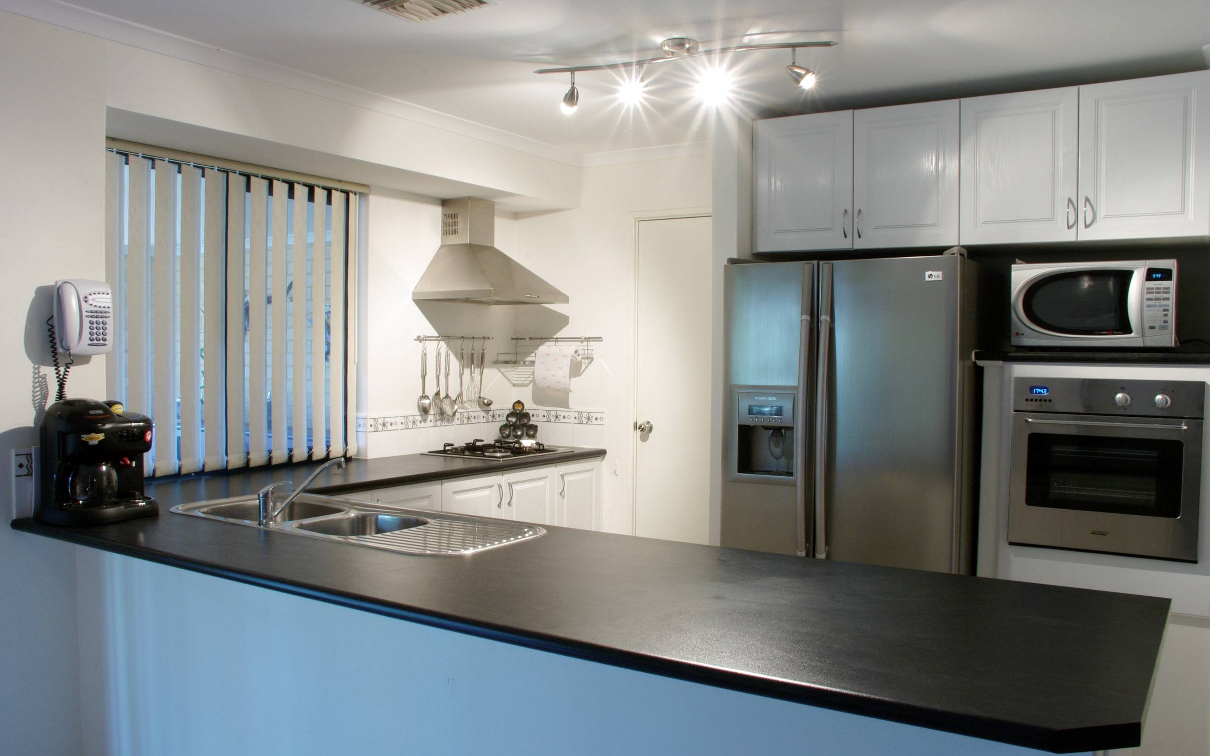 Kitchen with a stone-topped island